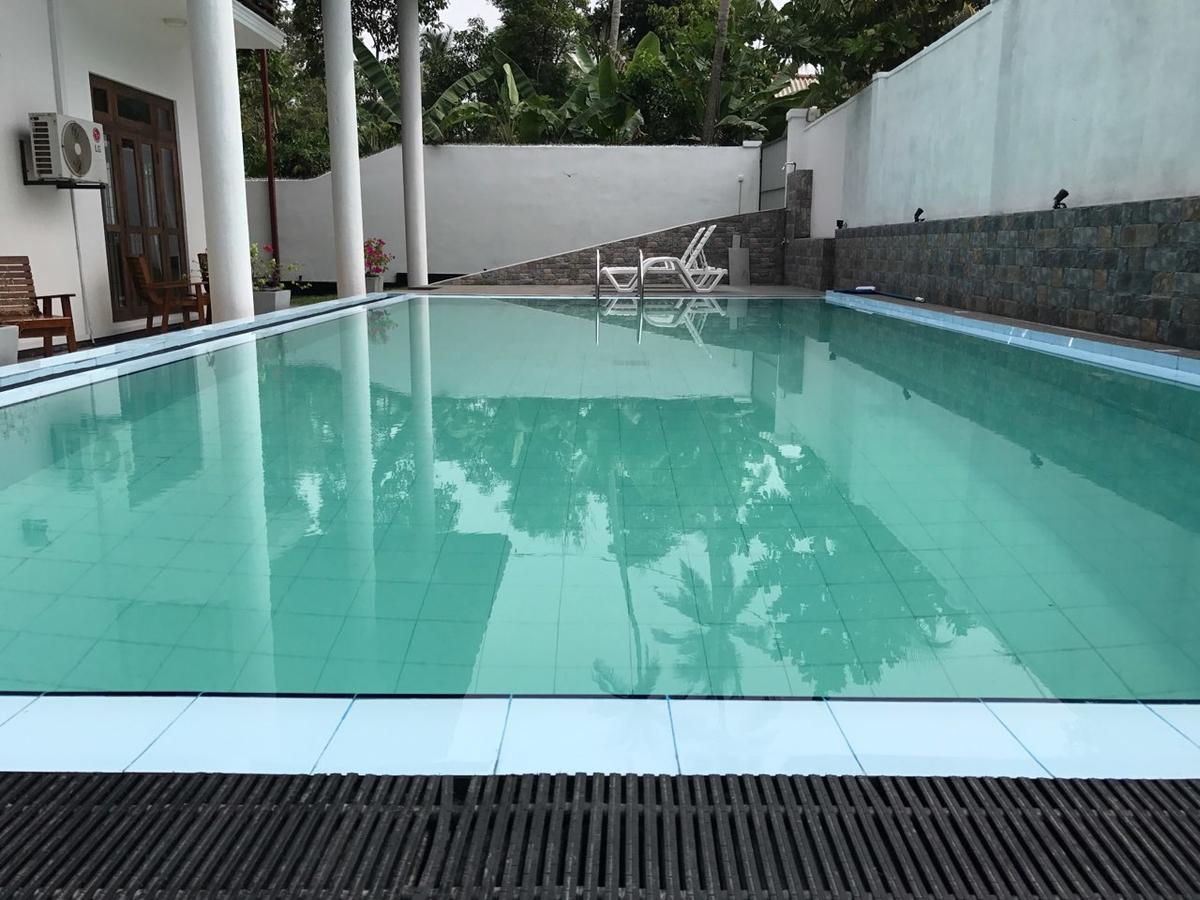 Villa 234 Boossa Bagian luar foto
